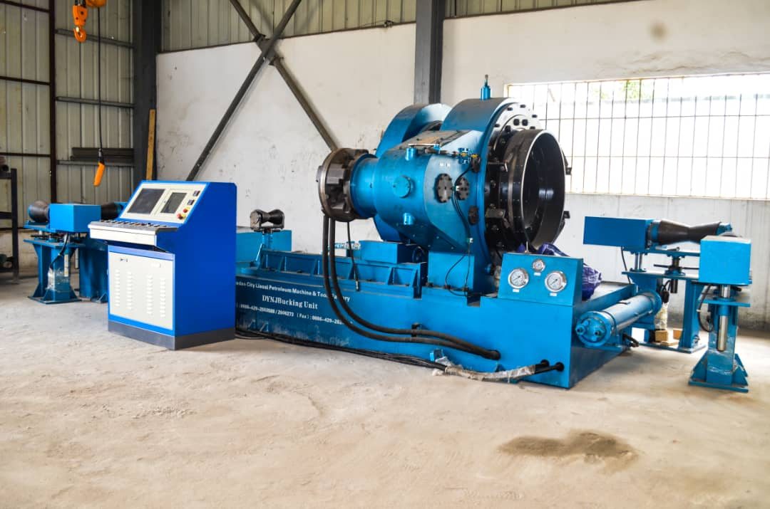 Automated bucking unit with torque-turn monitoring console